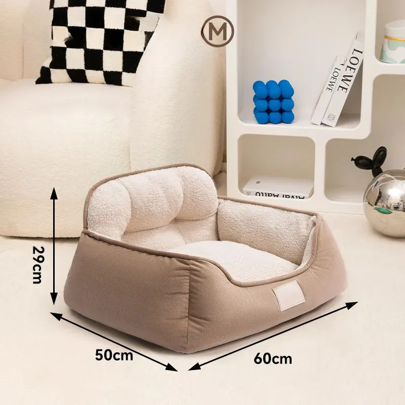 Plush pet bed in three sizes with washable fabric for indoor dog use