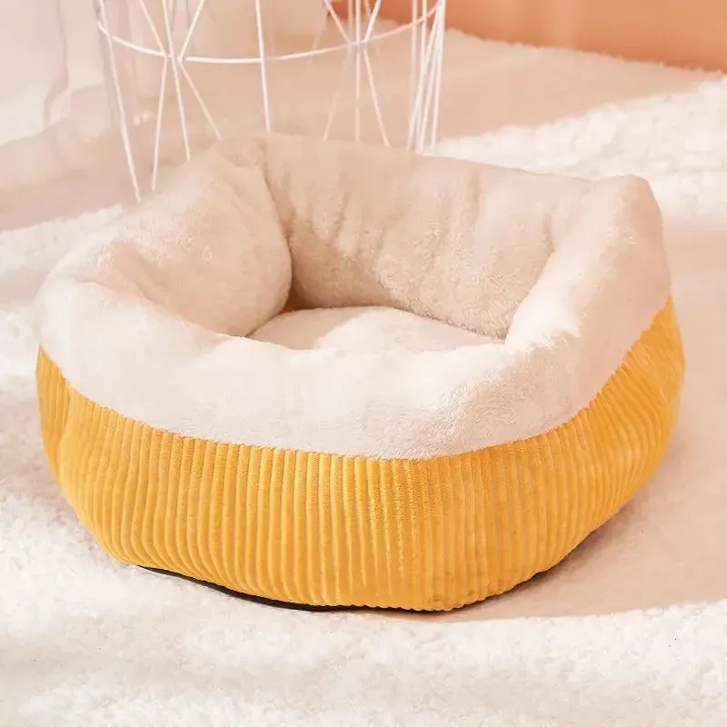 Washable circular cat sofa bed in yellow with plush fabric and non-slip base for calming sleep