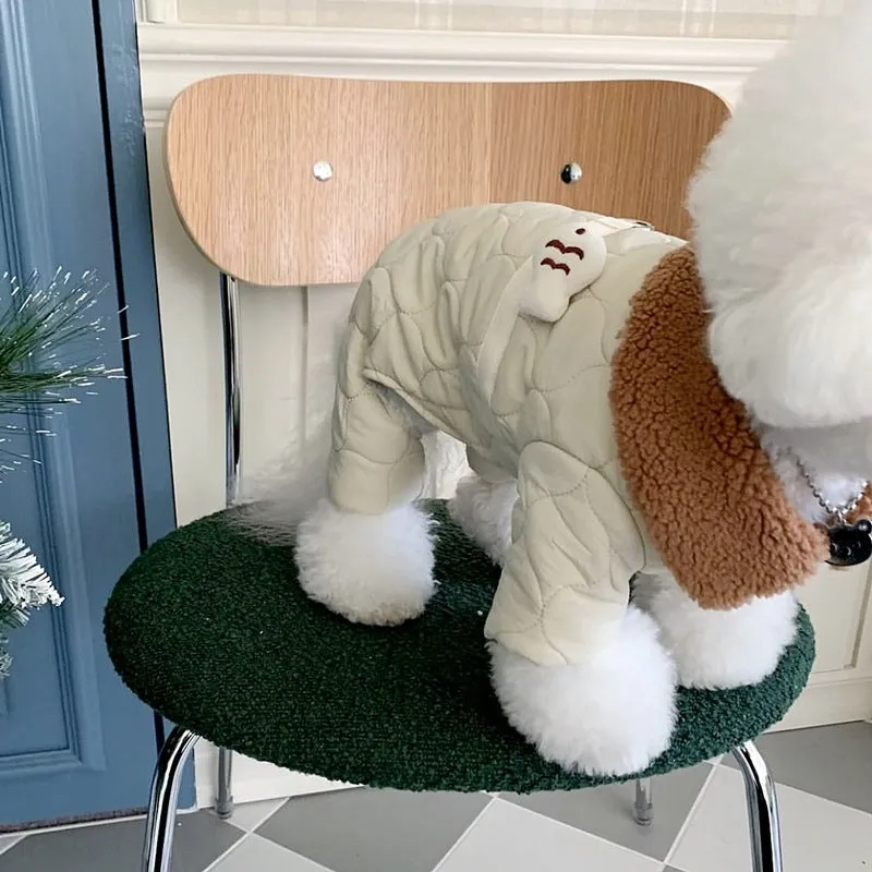 Dog wearing a four-legged cotton-padded winter coat in Small Green Fish pattern