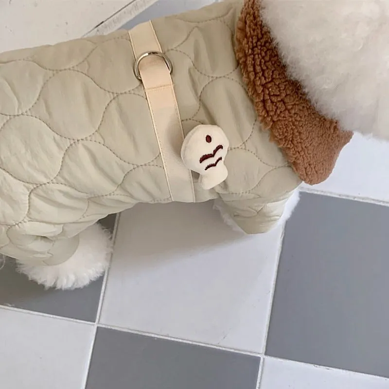 Dog wearing a four-legged cotton-padded winter coat in Small Green Fish pattern