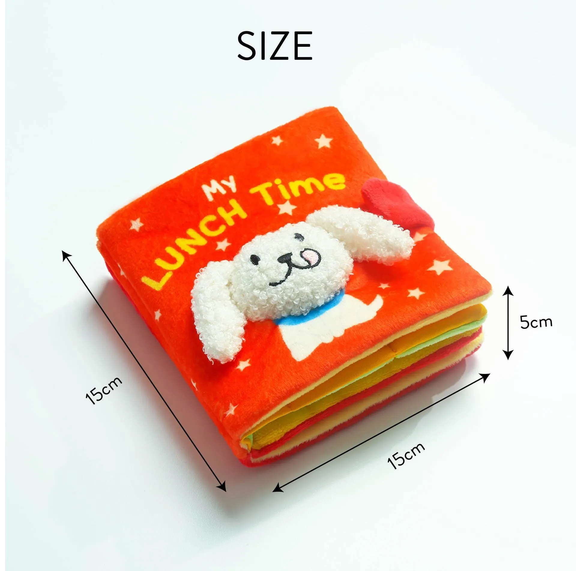Red book shaped plush pet toy with hidden food compartment and squeaky sound for dogs and cats