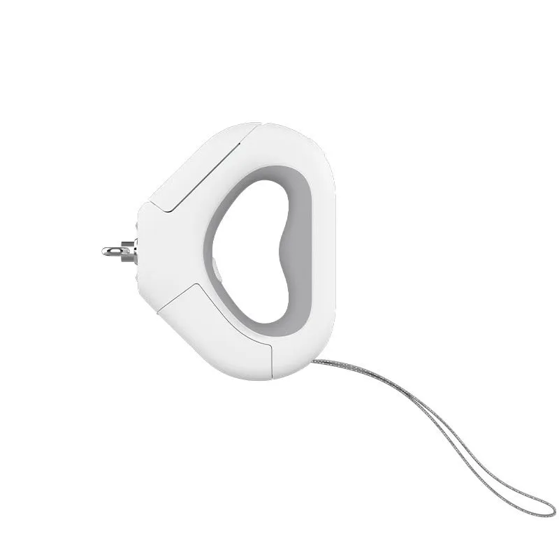 White plastic pet leashing device with spotlight light and snack bin box tractor ring