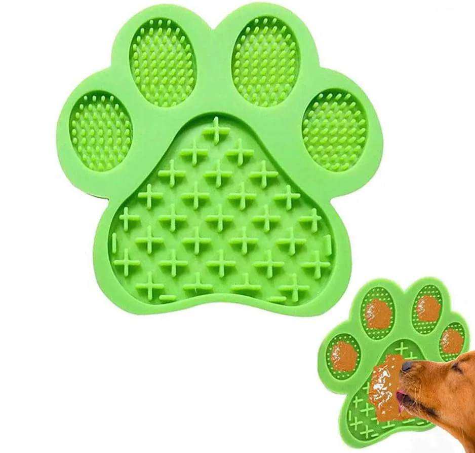 Blue bone-textured silicone dog licking mat with suction cups on back for bath time.