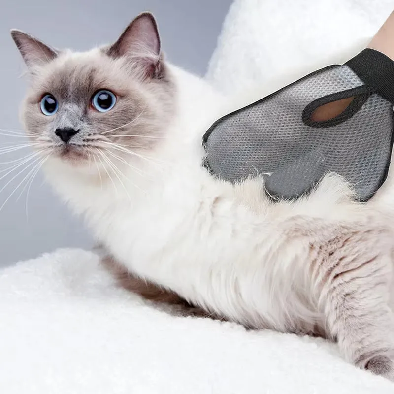 Gray pet grooming glove with silicone massage tips for removing loose cat and dog hair
