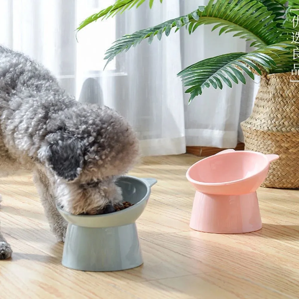 Ergonomic tilted raised plastic cat food bowl in blue with non-slip base for anti vomiting feeding