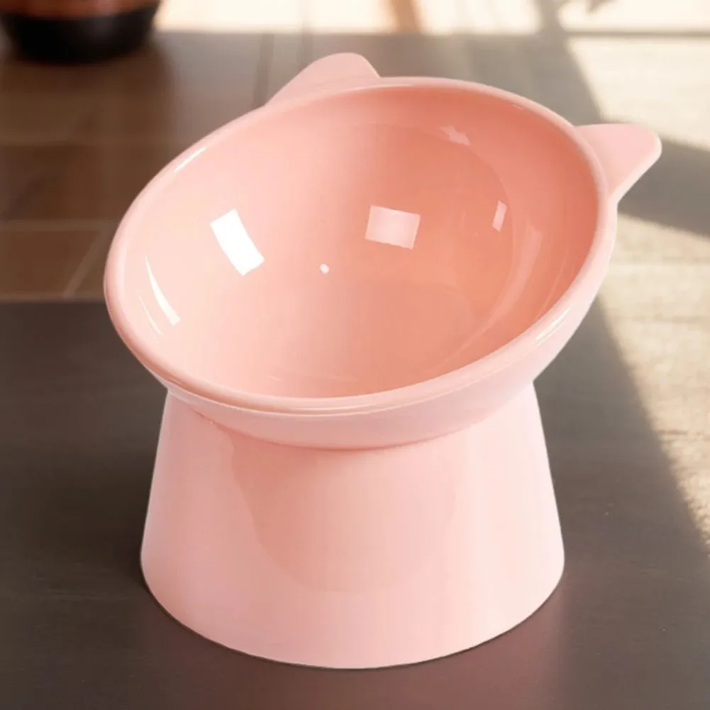 Ergonomic tilted raised plastic cat food bowl in blue with non-slip base for anti vomiting feeding