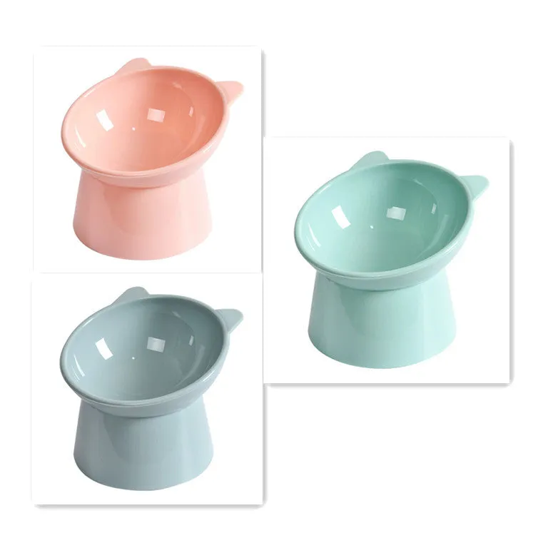 Ergonomic tilted raised plastic cat food bowl in blue with non-slip base for anti vomiting feeding