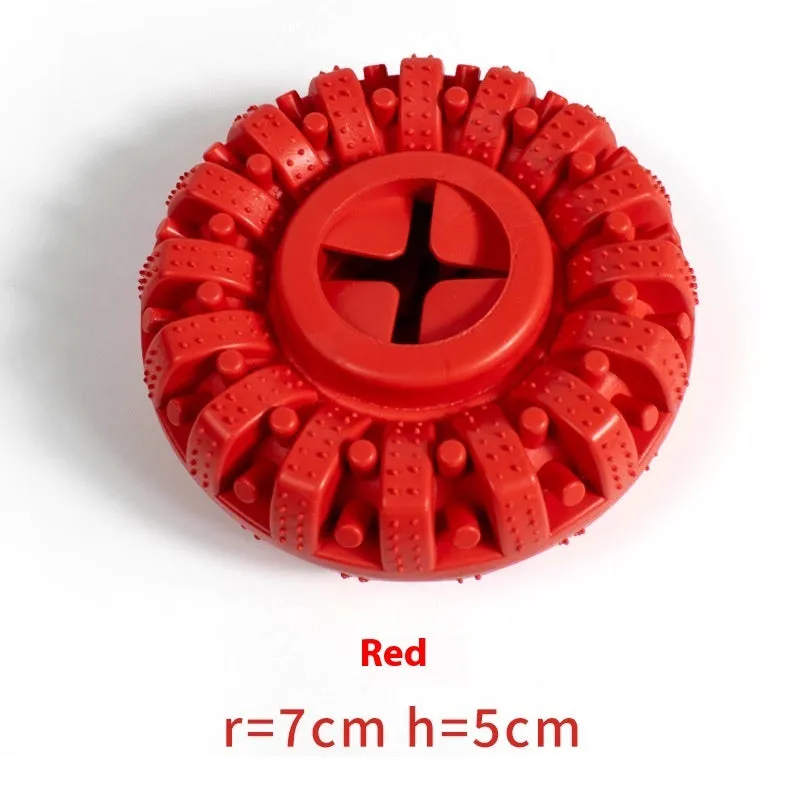 Black and red TPR dog food leakage tyre toy on surface, 14x5cm size