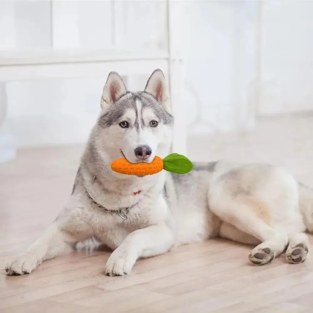 Orange carrot-shaped dog chew toy made of rubber and plush, measuring 21x5x5cm with a squeaker