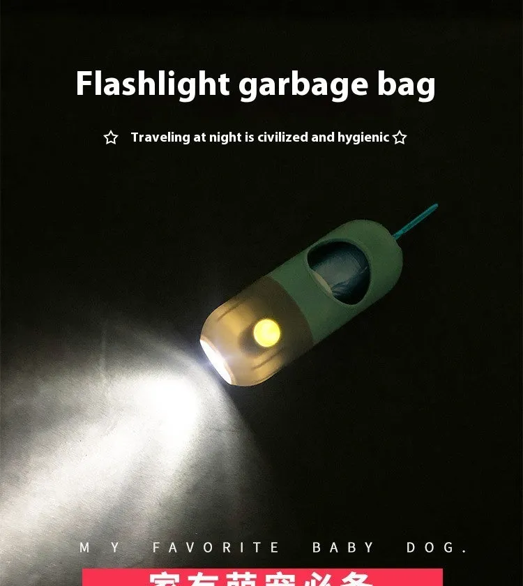 Compact LED pet waste bag dispenser in blue grey with a dog lead attachment and illuminated button