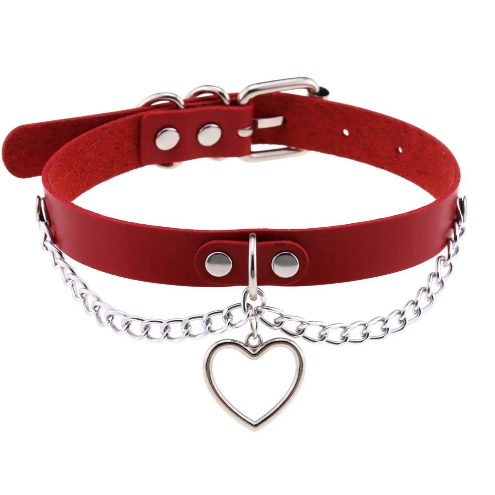 Heart-shaped leather collar clavicle necklace in black with chain link detail on woman's neck