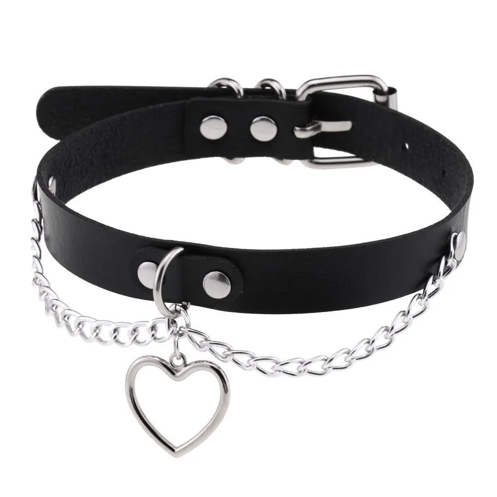 Heart-shaped leather collar clavicle necklace in black with chain link detail on woman's neck