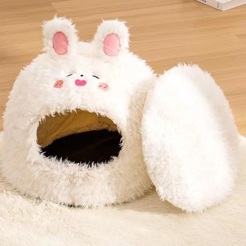 Closed warm plush cat nest in plush white bear colour, size M, on a wooden floor