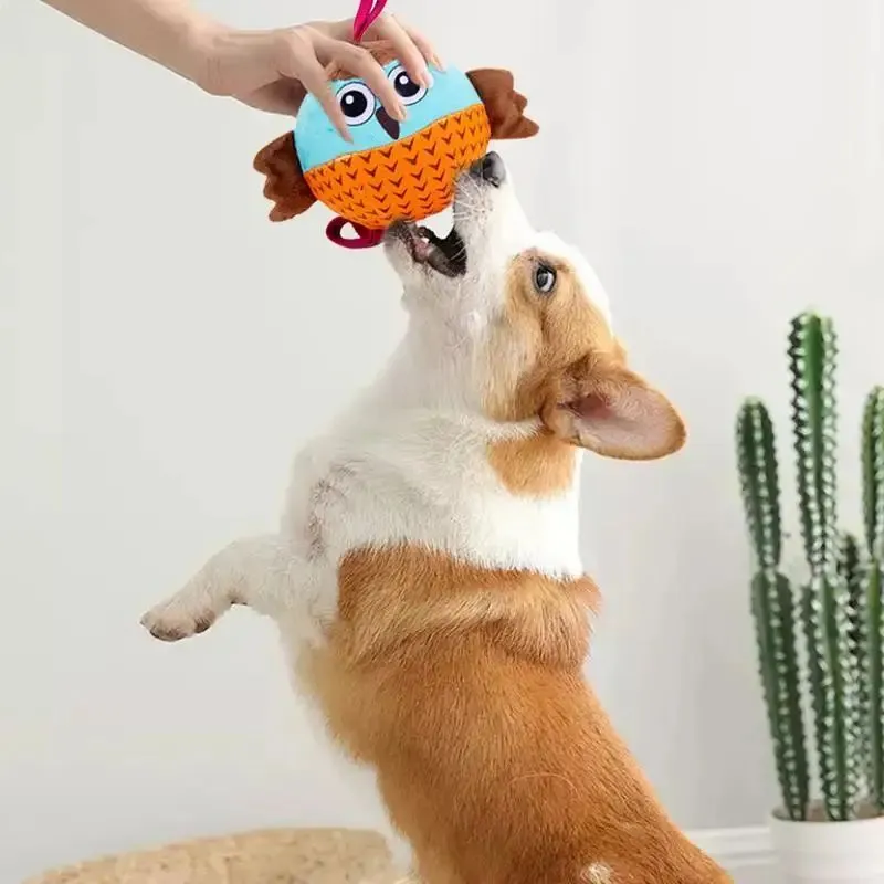 Orange interactive owl ball dog toy made from velvet and rubber for chewing and boredom relief
