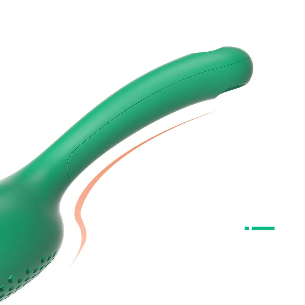 Green plastic cat litter scoop with hollow head and handle on white background
