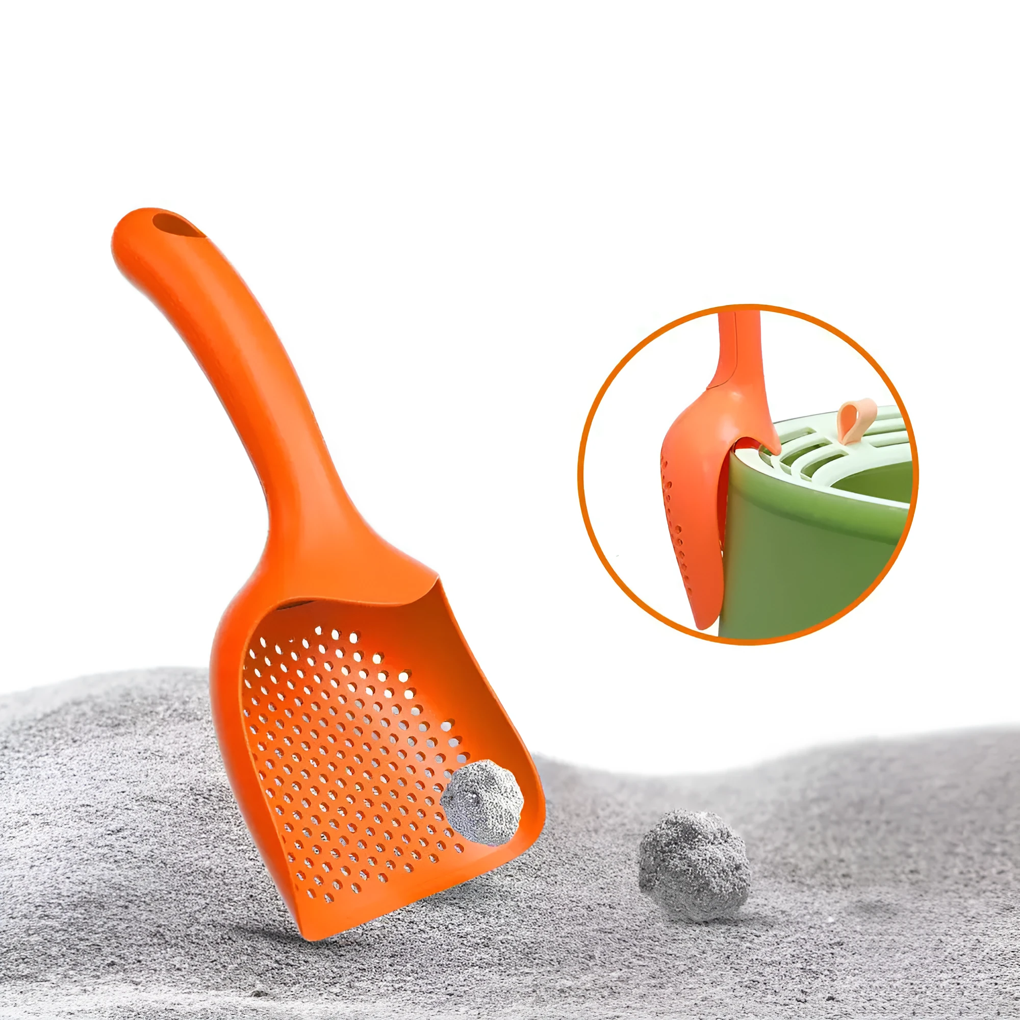 Green plastic cat litter scoop with hollow head and handle on white background