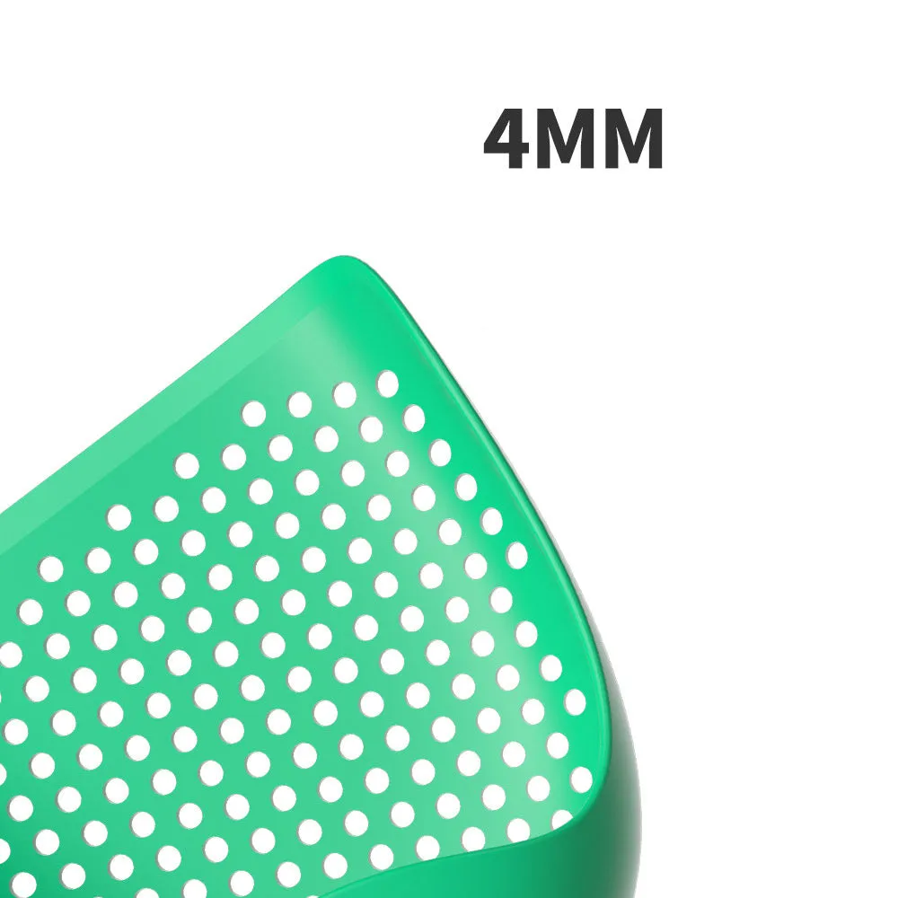 Green plastic cat litter scoop with hollow head and handle on white background