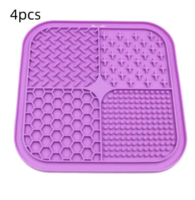 Green silicone pet licking pad 20x20cm with suction cup base on a tiled floor