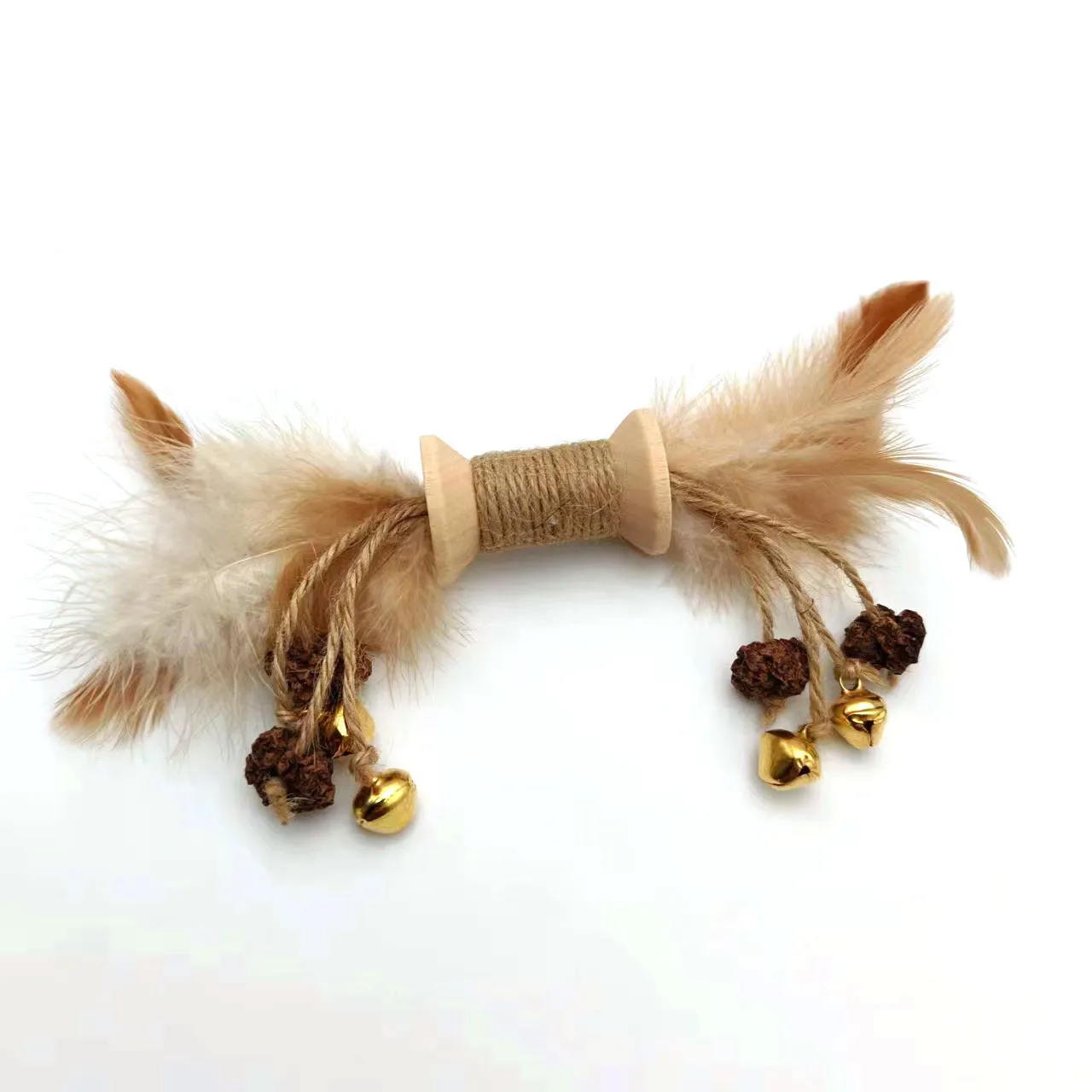 Feather bell gall fruit cat toy in ginger colour with bells and feathers on green background