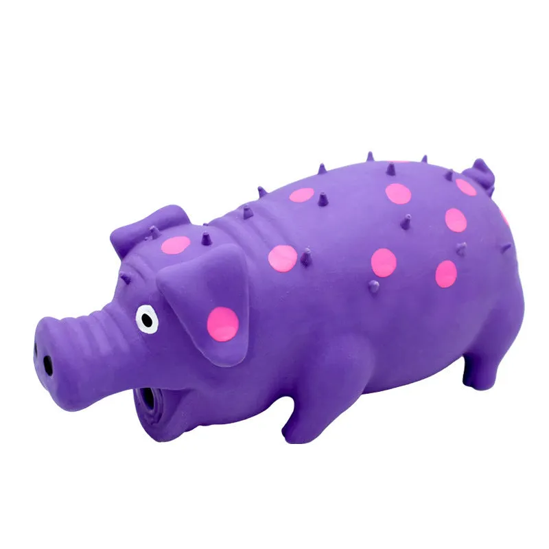 Pig shaped latex dog chew toy in various colours with squeaker for aggressive chewers