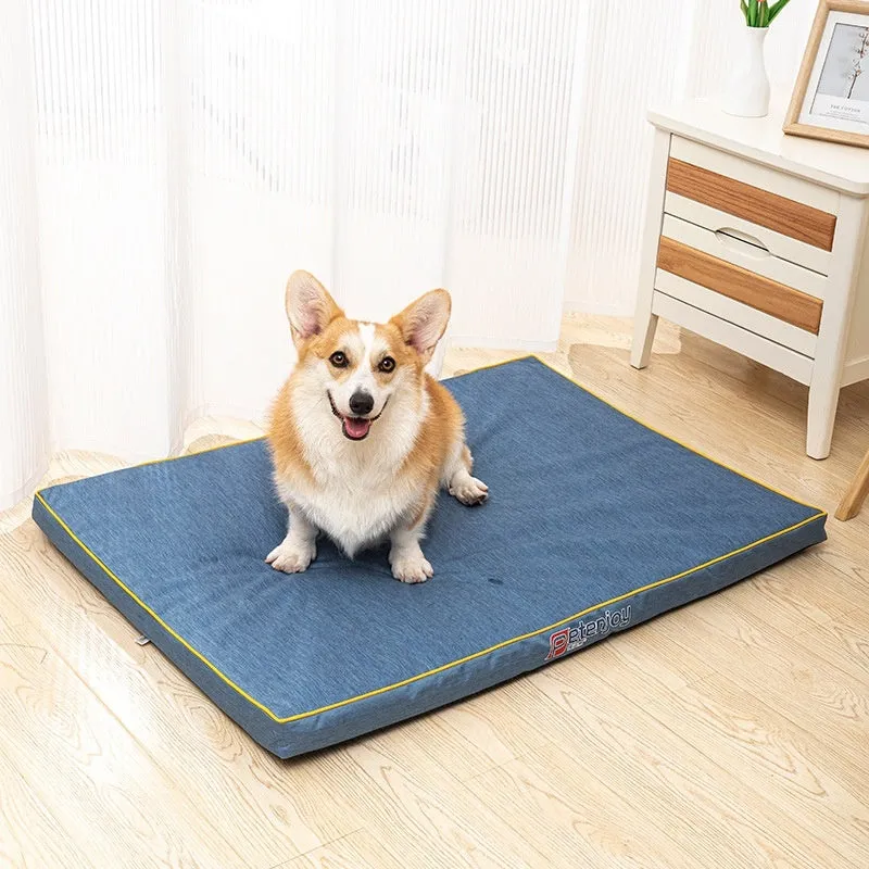 Oxford cloth waterproof scratch-resistant dog bed mat in Oxford blue, showing wooden base and size options for small to large dogs