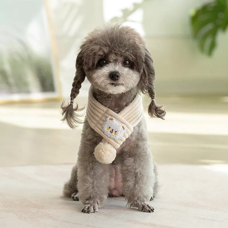Fashion knitted wool pet cat winter scarf with cartoon embroidery in beige on white background