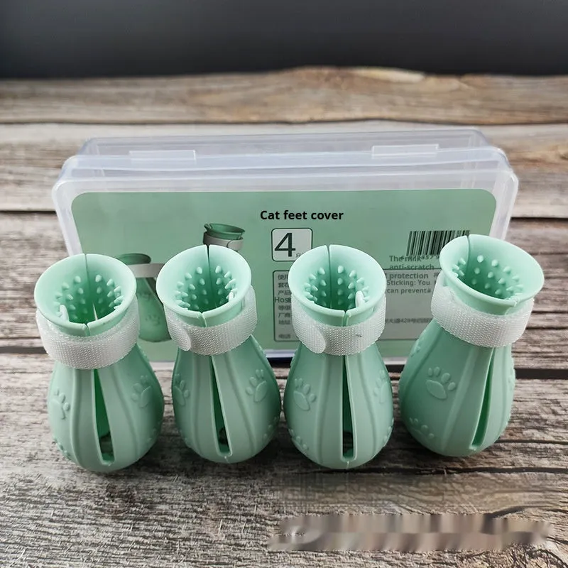 Set of cat foot covers in light blue, light green, and pink rubber for anti-scratch bath protection