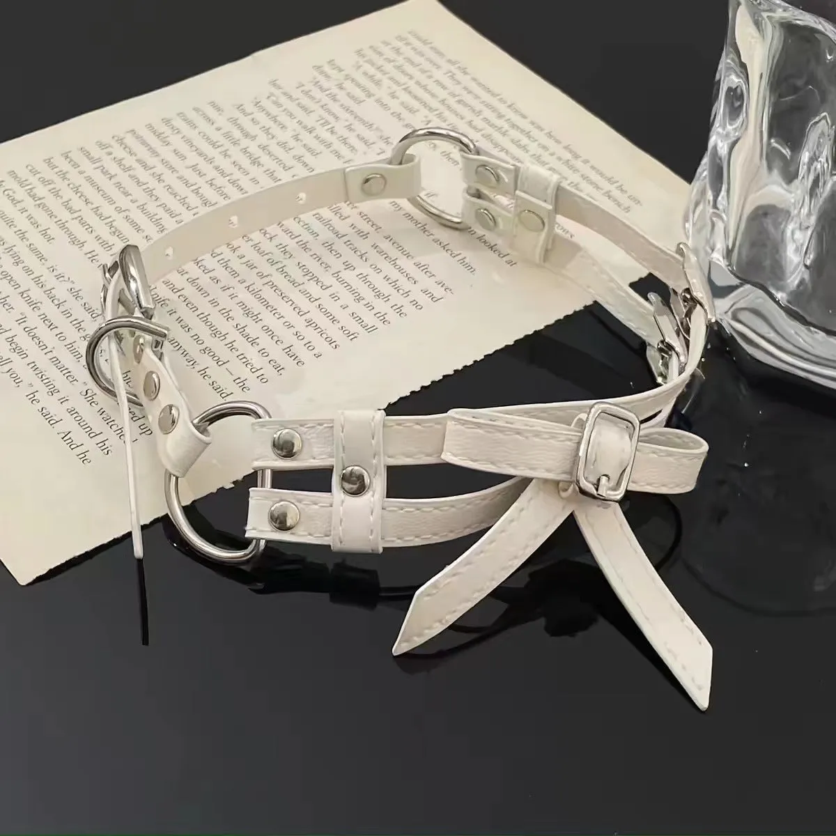 Women's cool white bow leather necklace with electroplated alloy pendant on leather cord