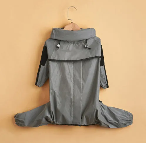 Dog wearing a reflective waterproof polyester raincoat in size M to 5XL for outdoor rain protection