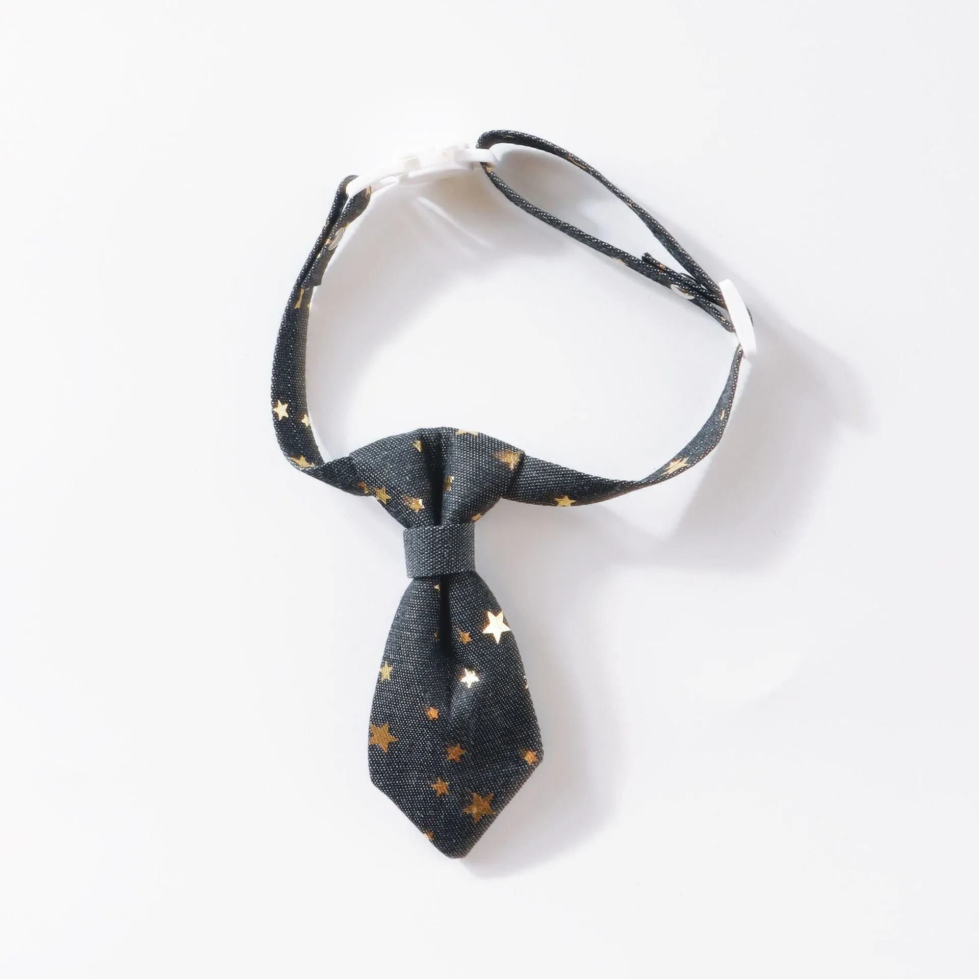 Designer dog collar with golden star decoration on adjustable strap, black colour, S size