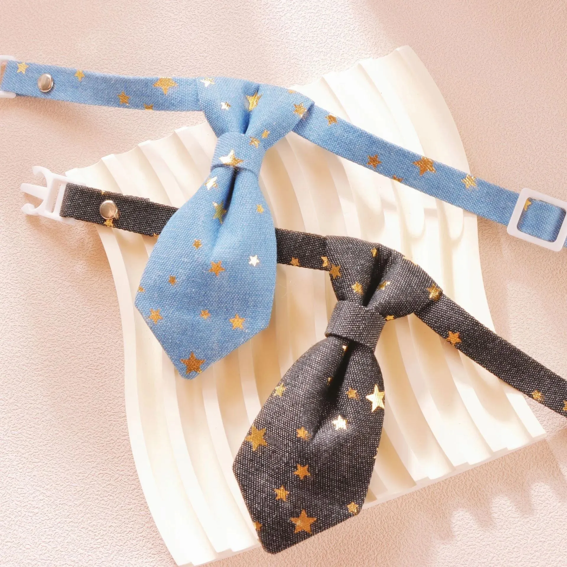 Designer dog collar with golden star decoration on adjustable strap, black colour, S size