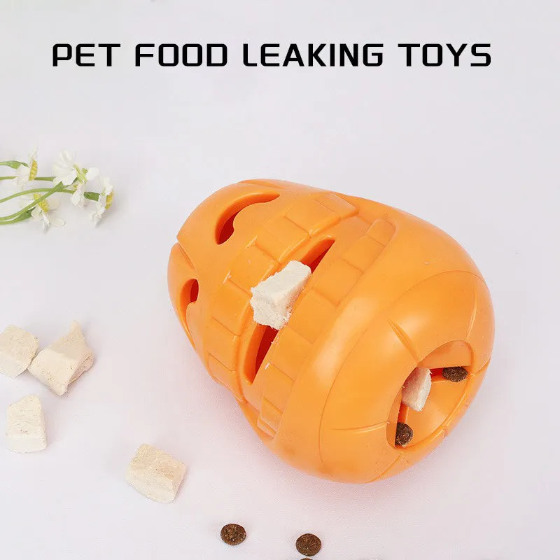 Orange Halloween pumpkin shaped dog chew toy with treat dispensing openings