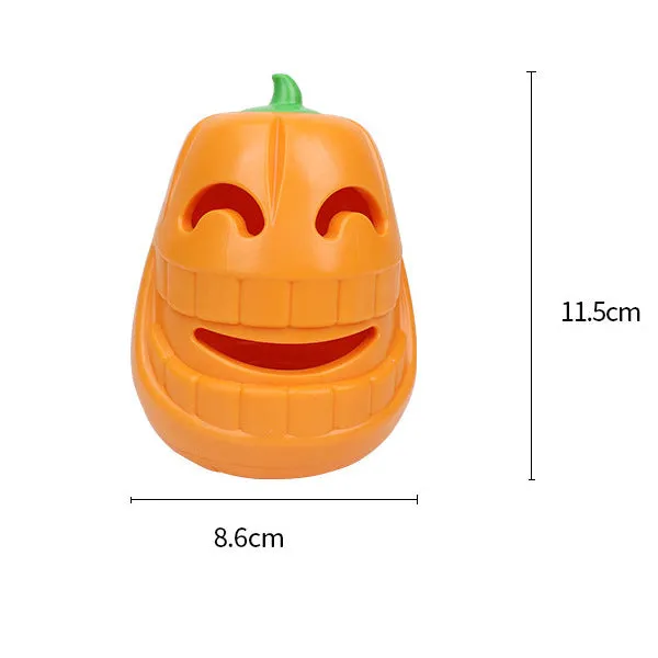 Orange Halloween pumpkin shaped dog chew toy with treat dispensing openings