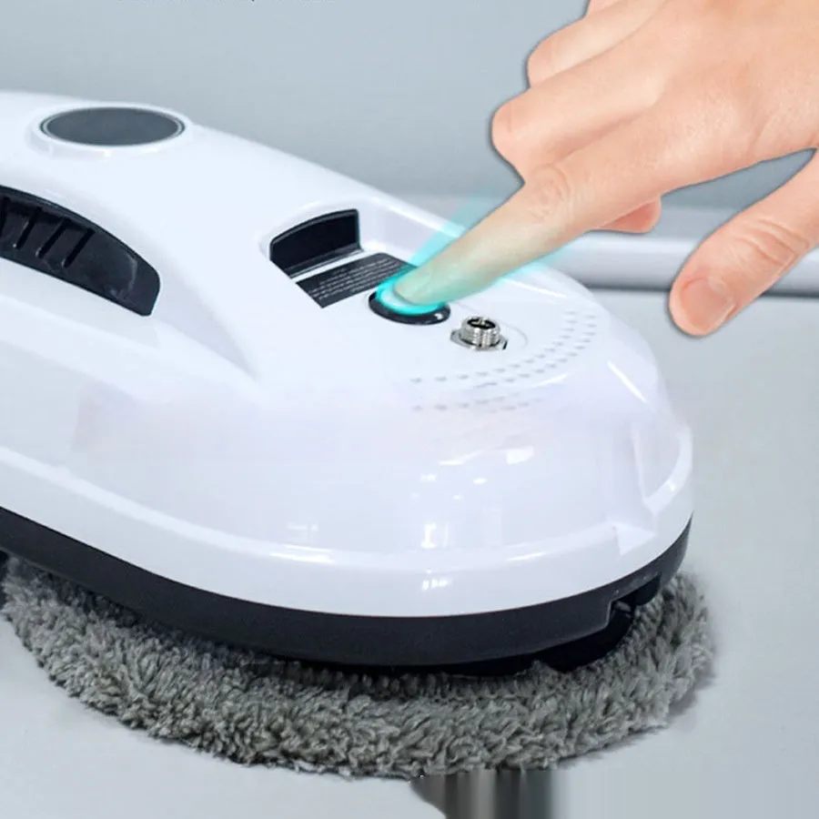 White automatic window cleaning robot with remote control, compact 28cm by 13cm by 9cm size