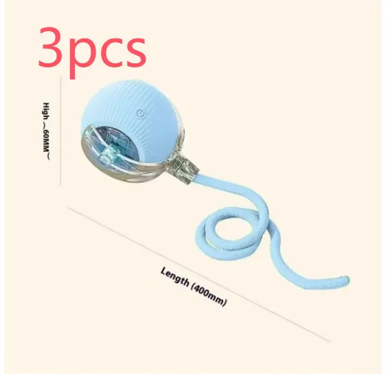 Electric cat toy automatic rolling ball in blue with rope attachment, on wooden floor
