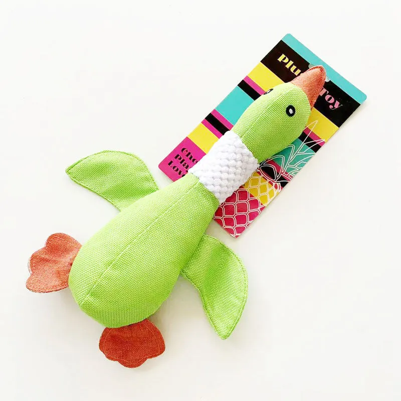 Blue durable plush duck dog toy with squeakers on a white background.