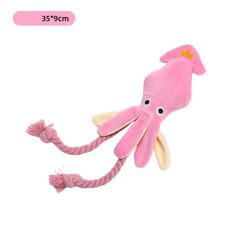 Cute pink plush octopus dog toy with BB squeaker and rope, 35cm long, lying on a light background.