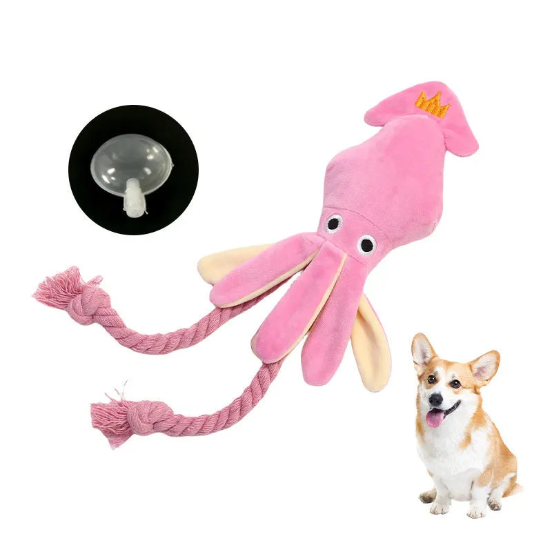 Cute pink plush octopus dog toy with BB squeaker and rope, 35cm long, lying on a light background.