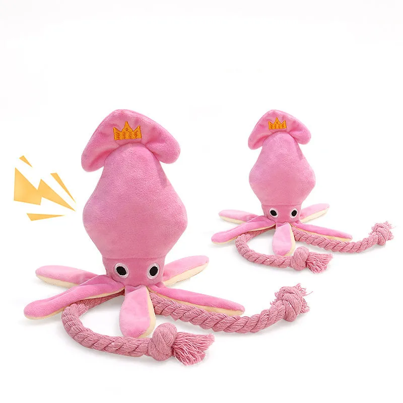 Cute pink plush octopus dog toy with BB squeaker and rope, 35cm long, lying on a light background.