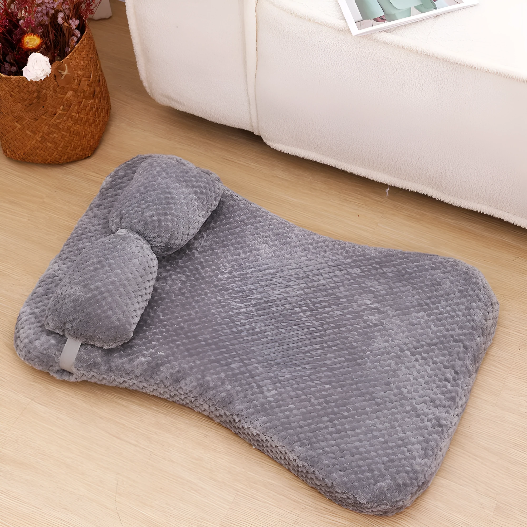 Soft plush pet bed mat with attached pillow in grey, available in sizes S to XL