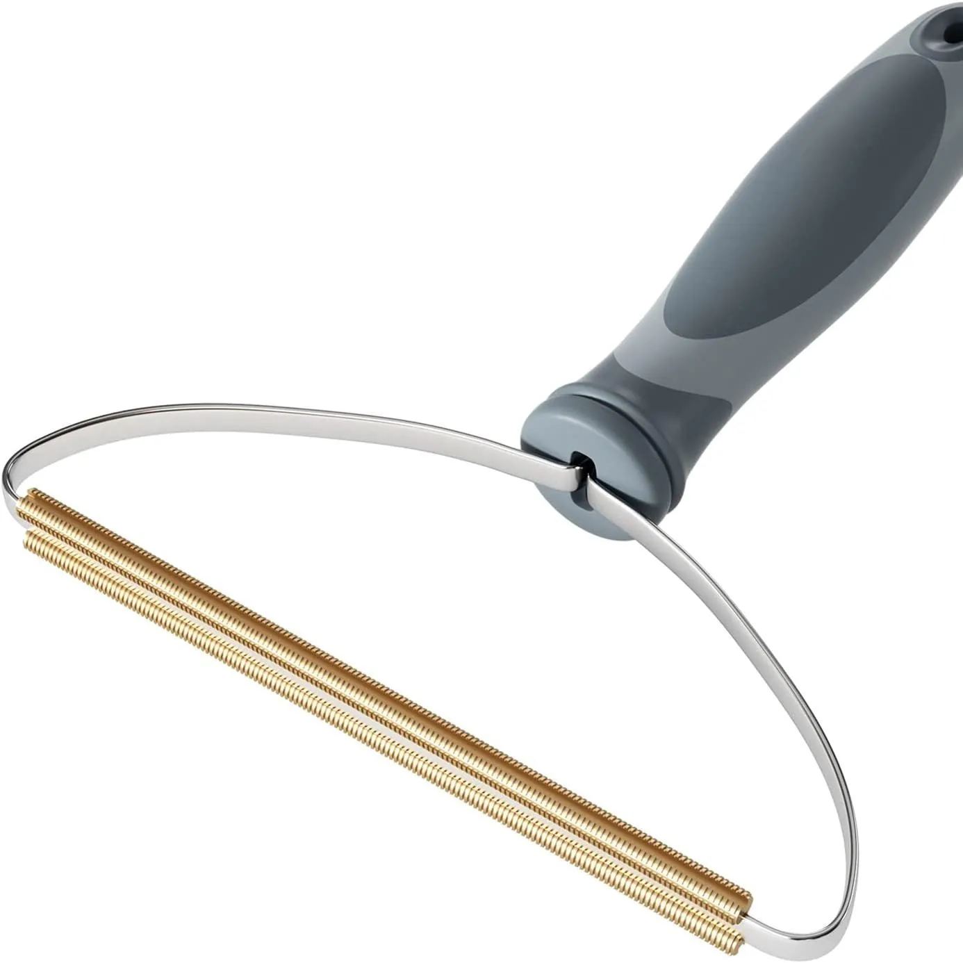 Grey pet hair remover with copper head, stainless steel frame, and ergonomic ABS handle for cleaning carpets and upholstery.