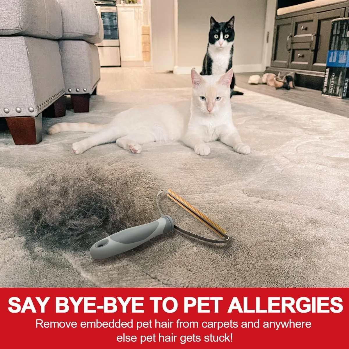 Grey pet hair remover with copper head, stainless steel frame, and ergonomic ABS handle for cleaning carpets and upholstery.