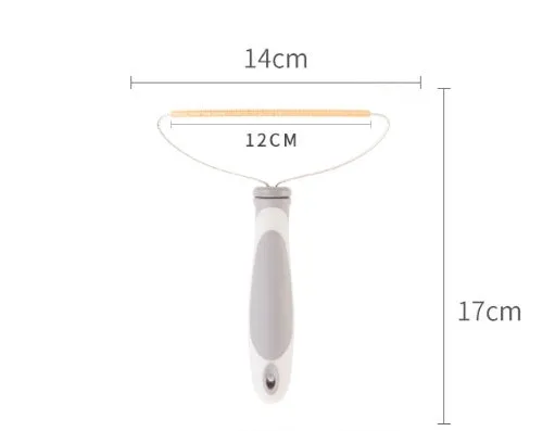 Grey pet hair remover with copper head, stainless steel frame, and ergonomic ABS handle for cleaning carpets and upholstery.