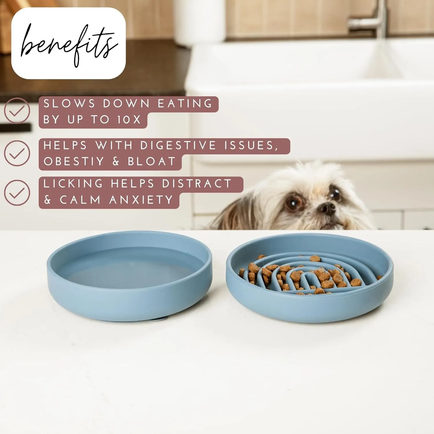Silicone slow feeder dog bowl with ridges in various colours on a table.