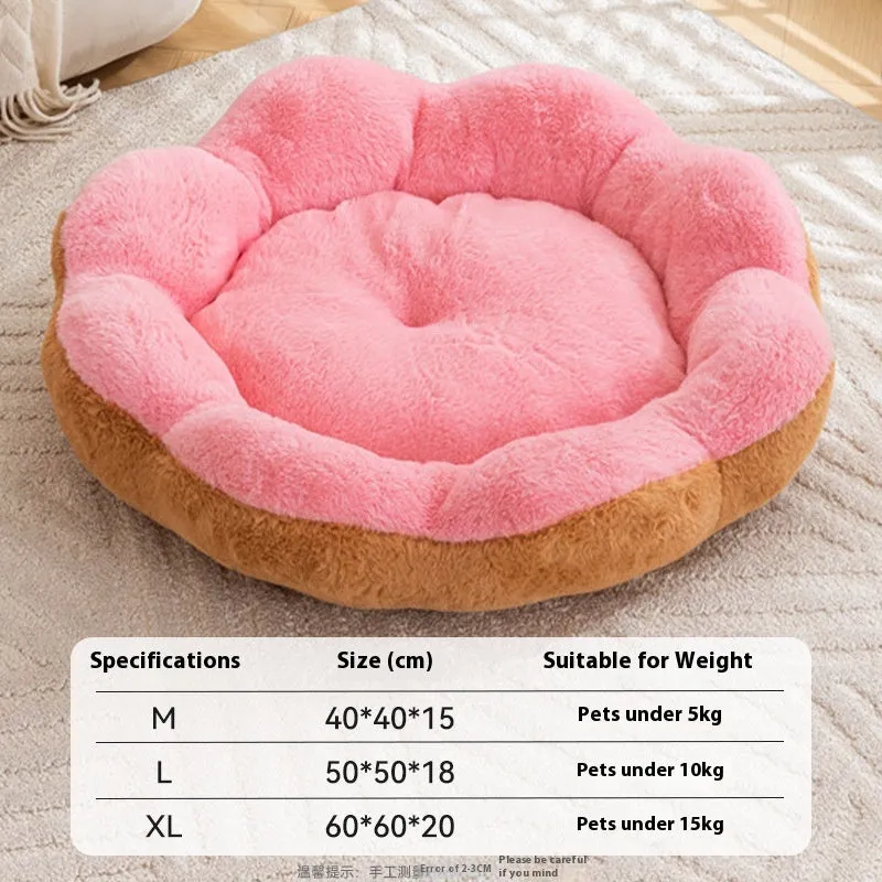 Round grey and black rabbit plush pet bed for cats with a thick, padded rim.