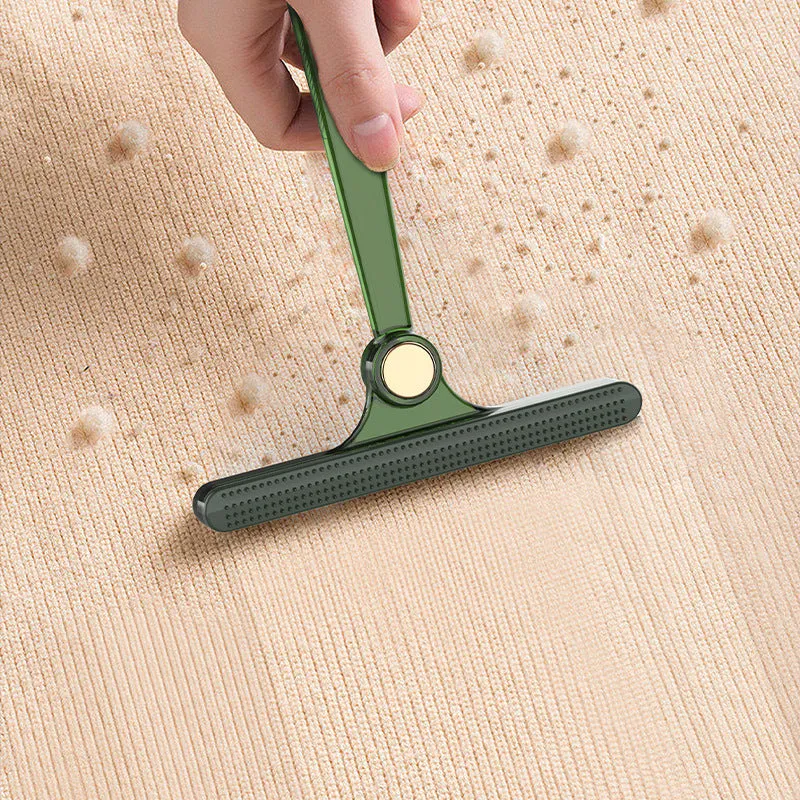 Manual fabric shaver with AS and TPE soft rubber body in transparent, green and yellow colours on white background
