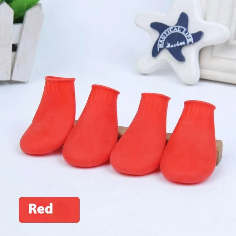 Black rubber foot strap waterproof pet boot for dogs with non-slip sole on white background