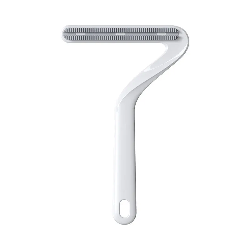 Double-sided pet hair removal comb in blue for removing cat and dog fur from beds and upholstery
