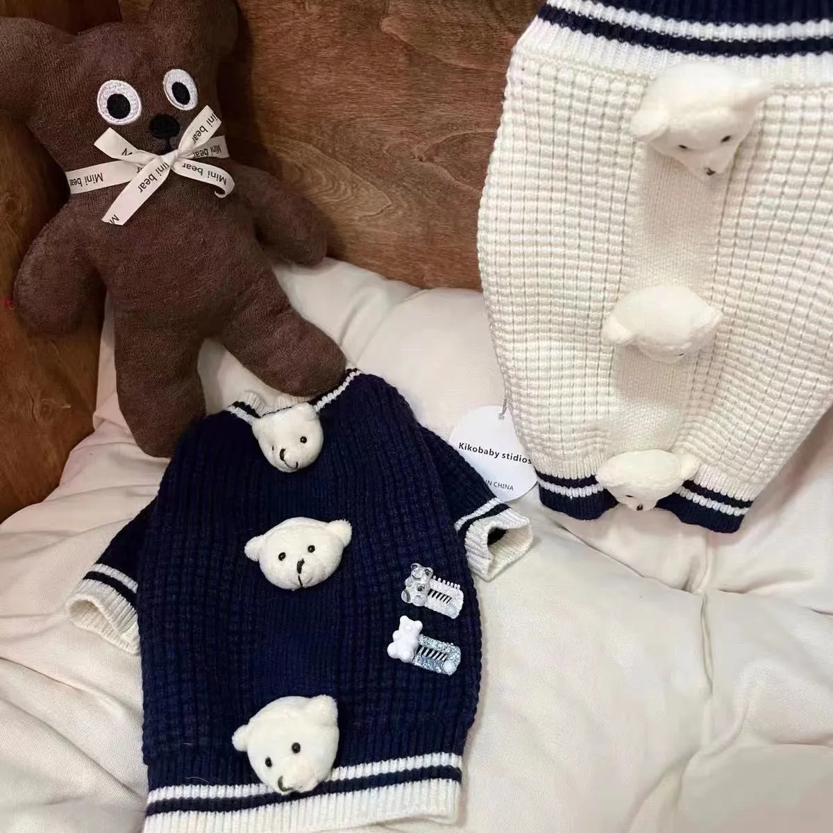 Pet cat spring sweater in navy blue polyester knit on a small cat, size M, side view