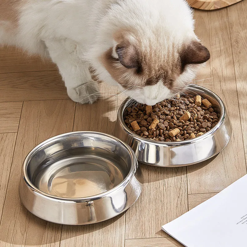 Thick stainless steel pet bowl with non-slip base, anti-fall rim, and bite-resistant construction